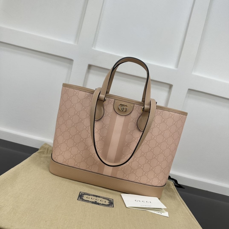G*u*i shopping bags